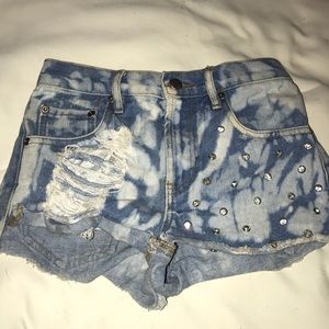 high waisted shorts; white washed splotches